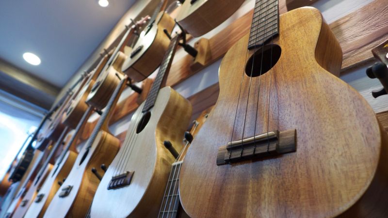 Ukuleles on the wall in a workshop