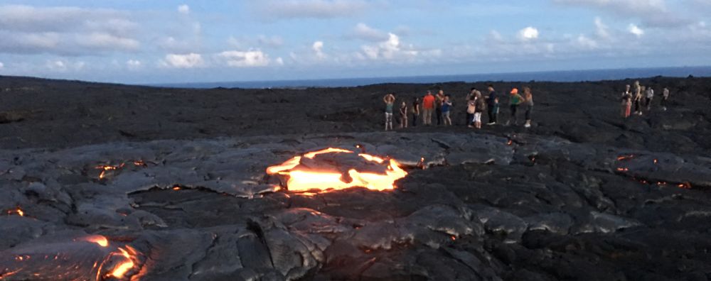 People looking at active lava flows near Kalapana, Big Island, Hawaii