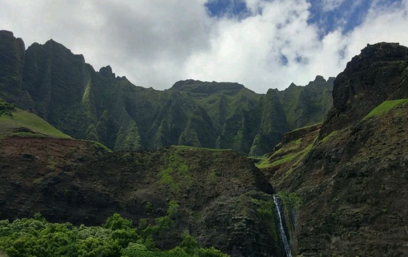 The mountains and the waterfall - the gorgeous backdrop for Kalalau Beach