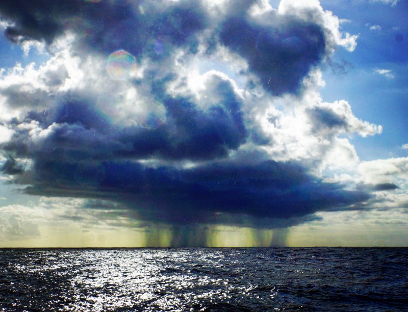 Clouds and rain over the sea near Na Pali Coast