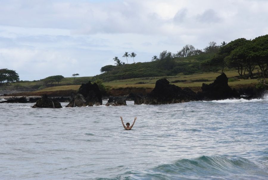 Road to Hana Itinerary: swimming on Hamoa Beach