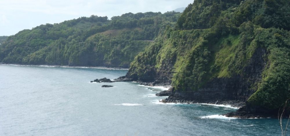 Road to Hana Itinerary: a view of the winding Hana Highway from the ocean
