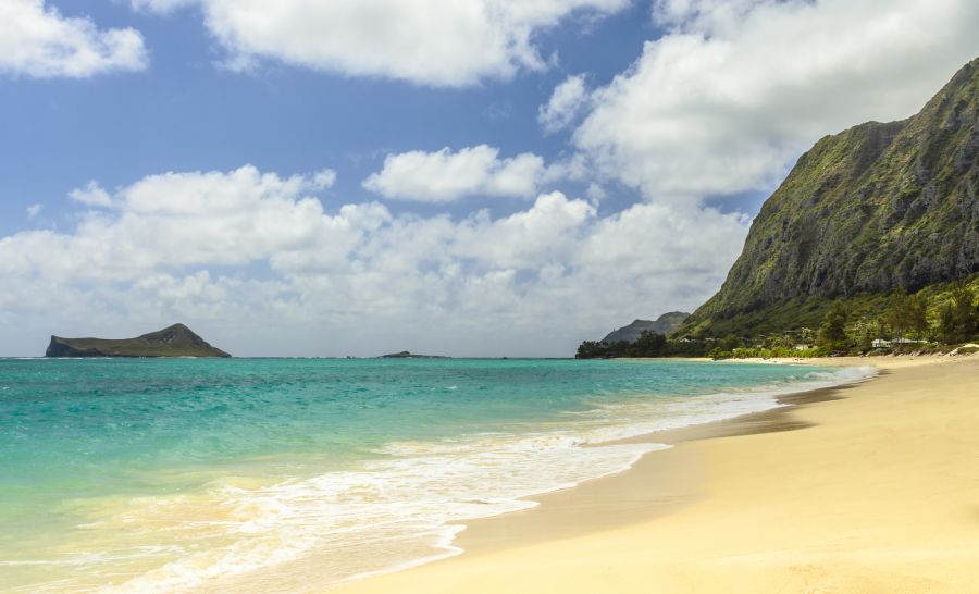 Hawaii Five-0 filming locations: Waimanalo Beach looking south towards Makapuu Point and Manana Island, commonly referred to as Rabbit Island, on Windward Oahu, Hawaii