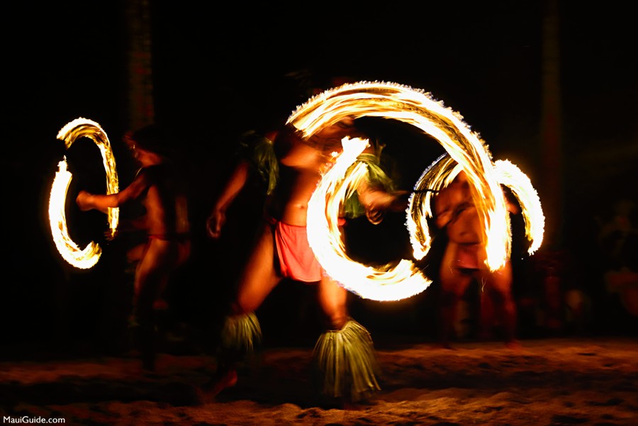 December in Maui: fire dancers at a luau show