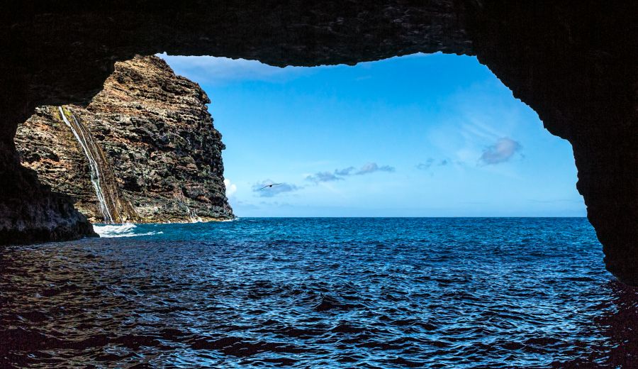 View to the ocean from the inside of a sea cave on Na Pali Coast, Kauai