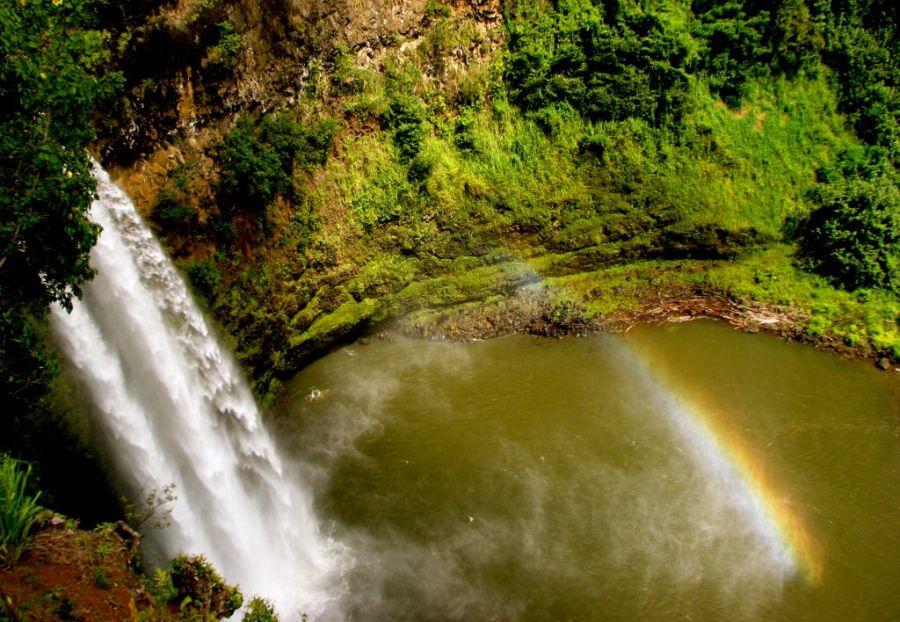 Kauai Travel Guide: early morning rainbow over Wailua Falls, Kauai