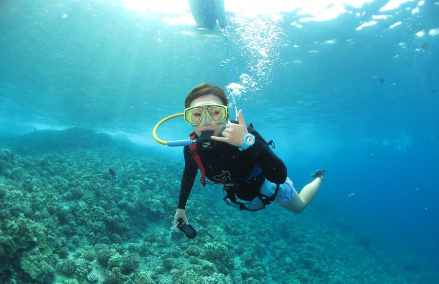 Snorkeling and Scuba put together = snuba, where you swim underwater and walk on the seafloor breathing through a long hose attached to air on a boat.