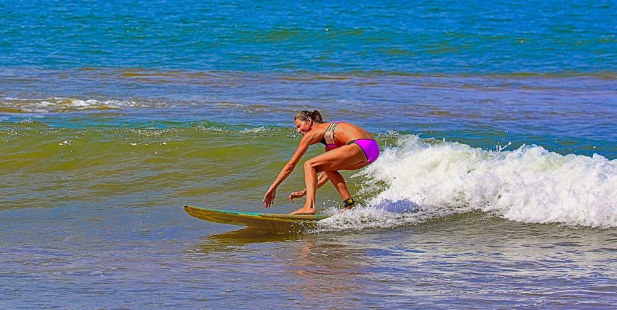 Surfer standing on the board - Kihei, Maui