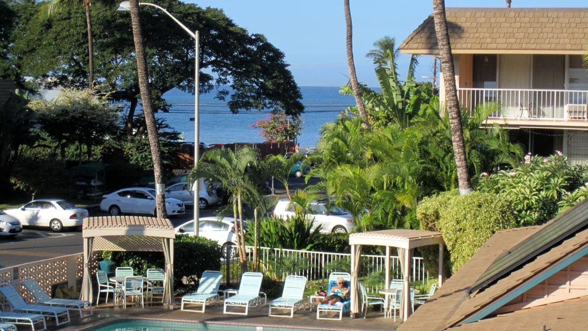 Ocean and our beach Kamaole II is only a two minute walk.  View the ocean looking over our large 30x60 swimming pool