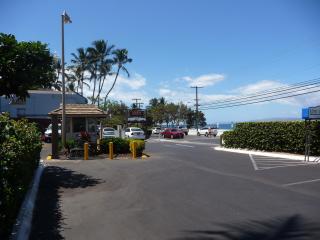 Kihei Kai Nani Resort parking lot showing the ocean just across South Kihei Road