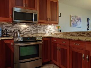 Room for two in our expanded and upgraded kitchen with convection microwave over range.