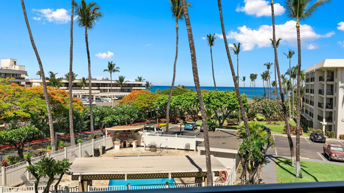 Aloha-inducing palm trees, hibisci, plumerias... and ocean view from your lanai