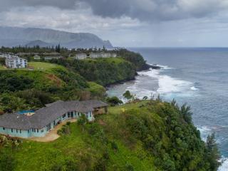 Views from every room with a terraced peninsula leading to the end of the point.