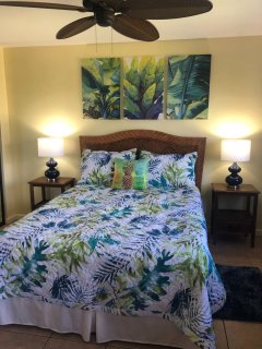 Listen to the waves all night long in the oceanfront primary bedroom