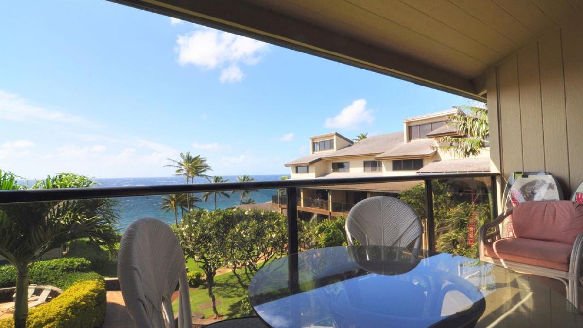View from the lanai.  Be on the lookout for whales and dolphins! Round table with 4 chair and two additional chairs make dining and relaxing easy!