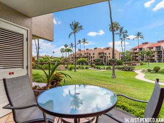 Kamaole Sands 7-106: Lanai which opens up onto beautiful resort grounds..short walk to pools, jacuzzis, fitness, center, game room, tennis courts and beaches! Also a peak-a-boo ocean view for a ground floor unit!